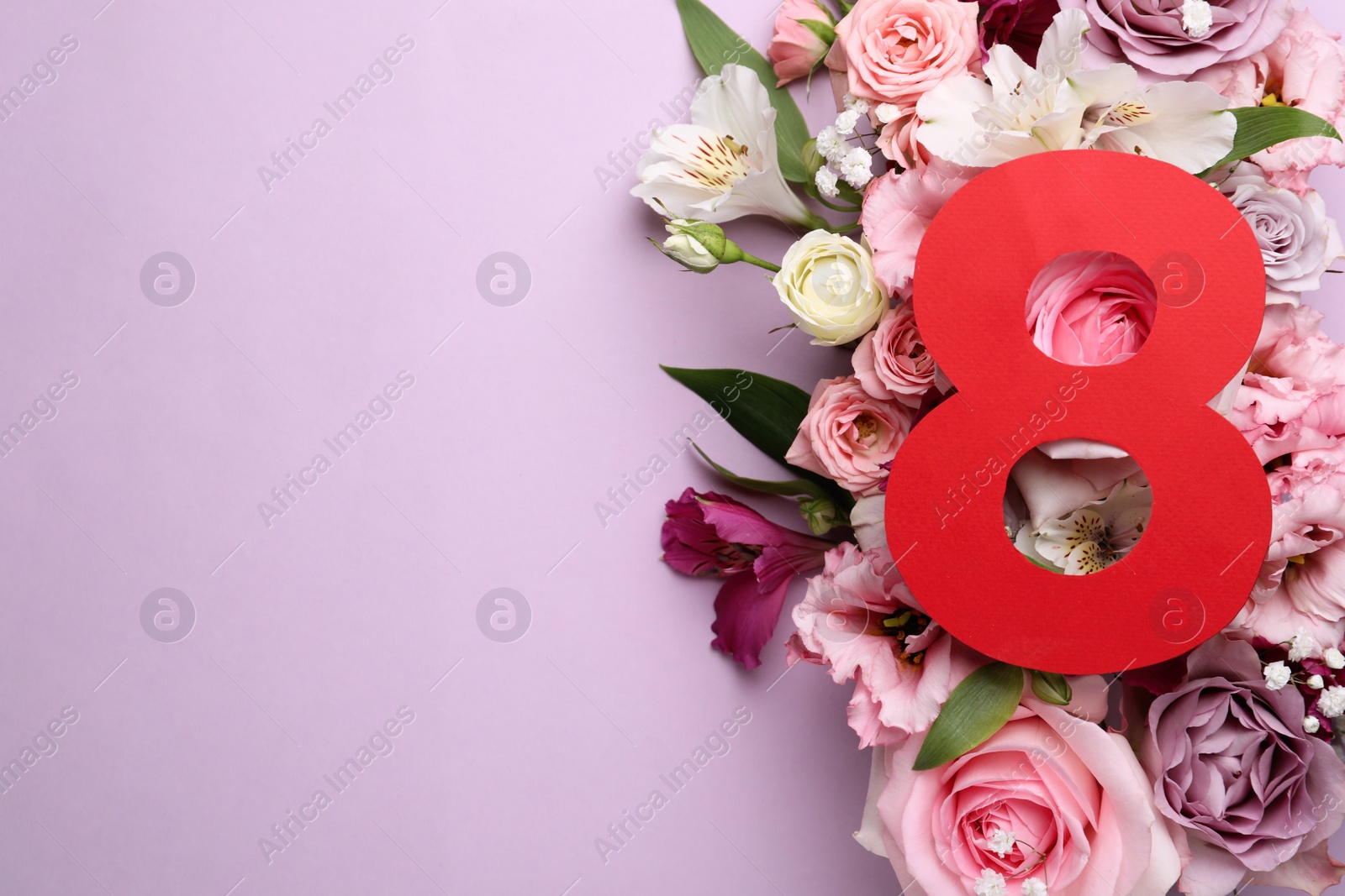 Photo of 8 March greeting card design with beautiful flowers on violet background, flat lay and space for text. International Women's day