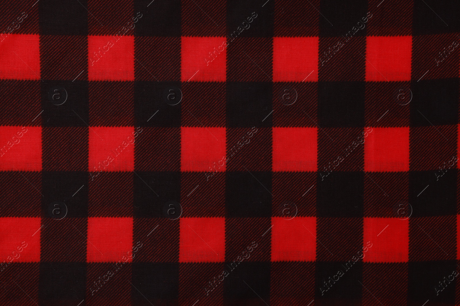 Photo of Top view of red bandana with check pattern as background
