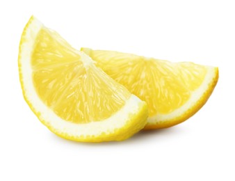 Photo of Pieces of fresh lemon isolated on white