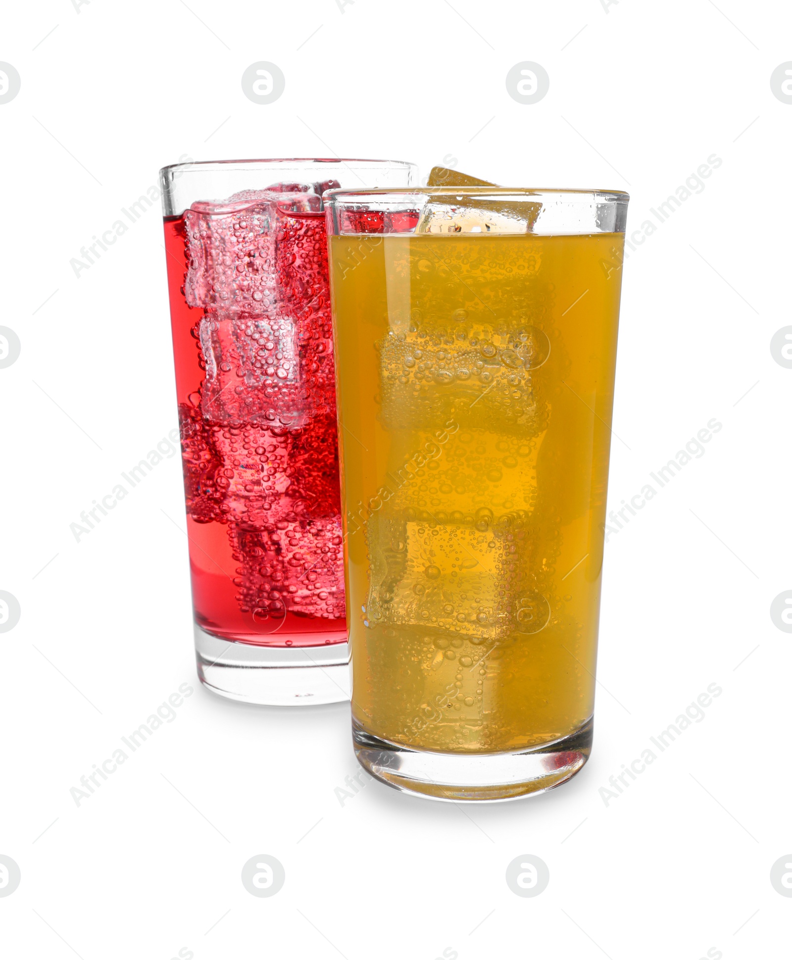 Photo of Glasses of different refreshing soda water with ice cubes isolated on white