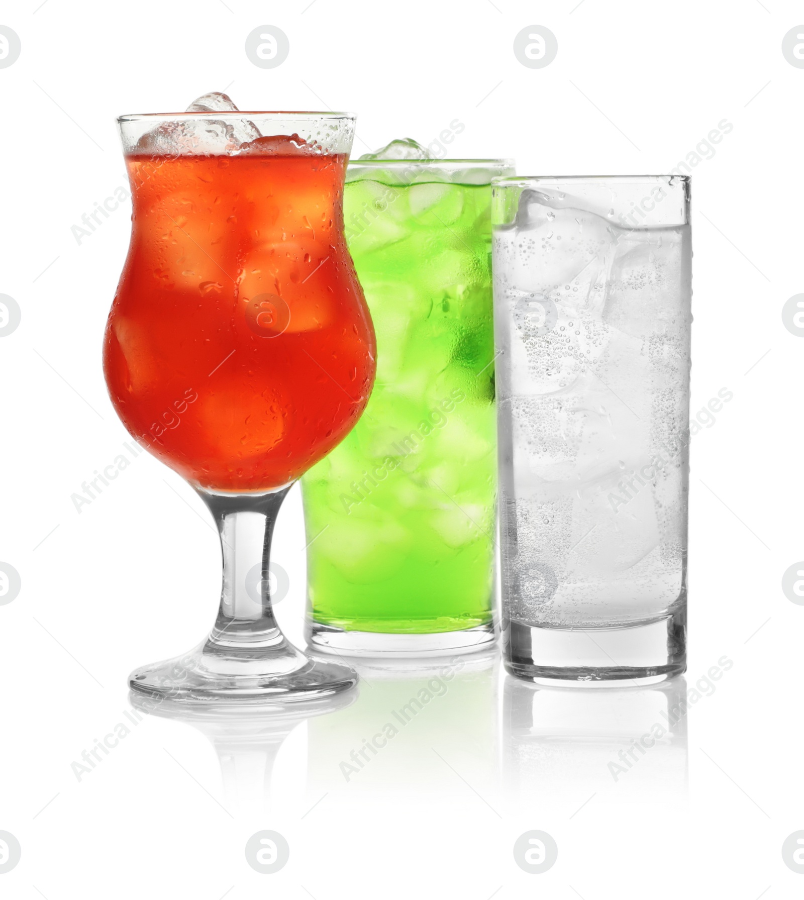 Photo of Delicious refreshing drinks in glasses on white background