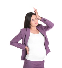 Young pregnant woman suffering from pain on white background. Working while expecting baby