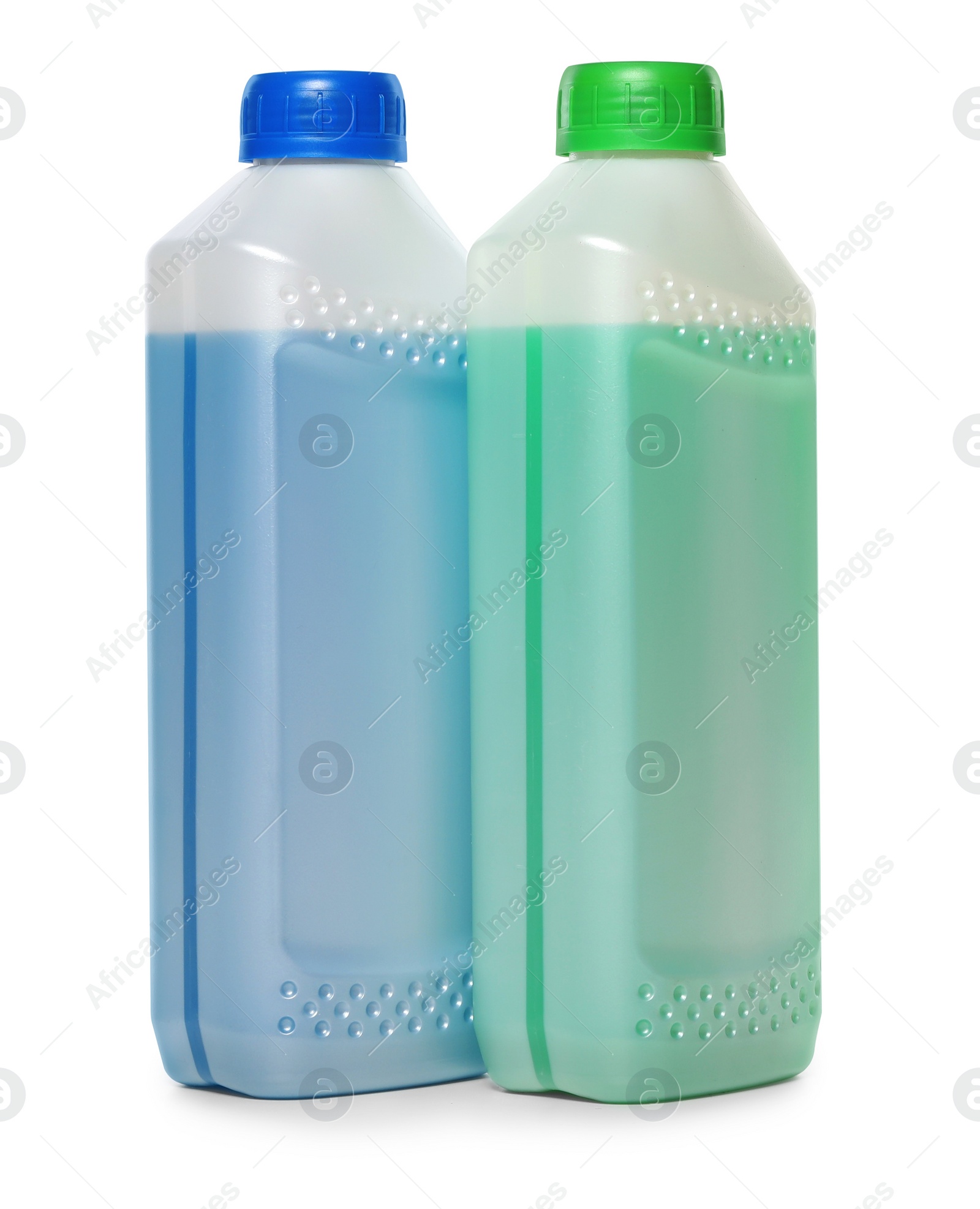 Photo of Antifreeze in plastic bottles isolated on white