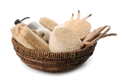 Photo of Set of toiletries with natural loofah sponges in wicker basket isolated on white