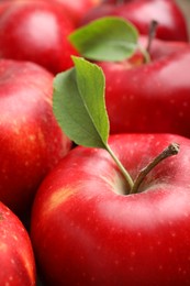 Delicious ripe red apples as background, closeup