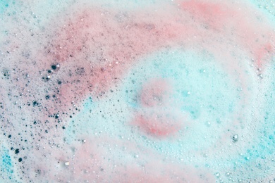 Photo of Viewfoam after dissolving color bath bomb in water, closeup