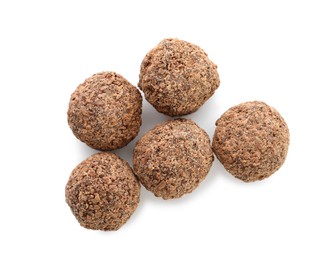 Delicious chocolate truffles on white background, top view