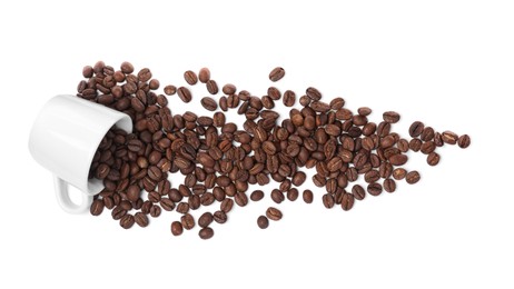 Photo of Overturned cup with roasted coffee beans on white background, top view