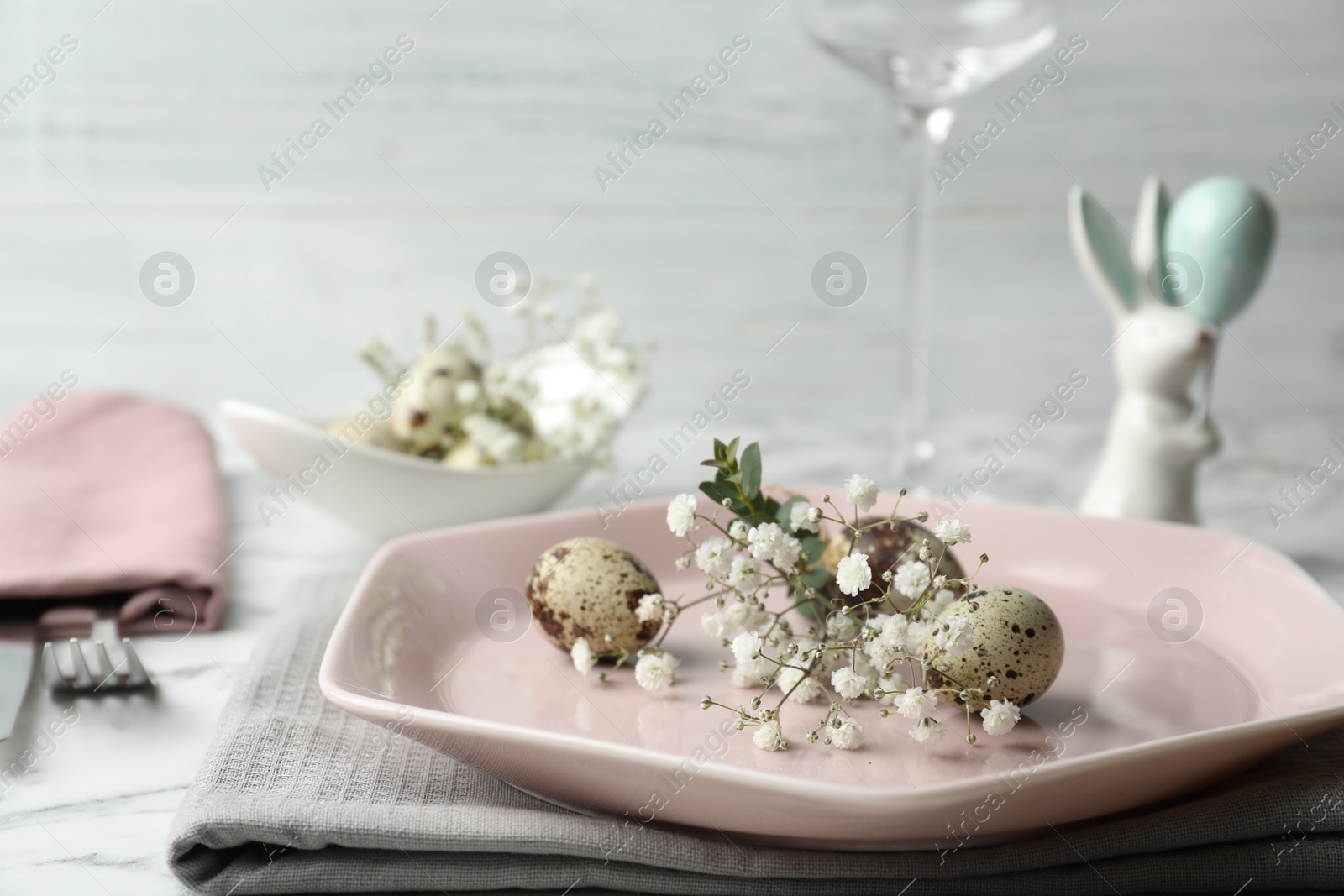 Photo of Festive Easter table setting with beautiful floral decor