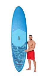 Photo of Handsome man with blue SUP board on white background