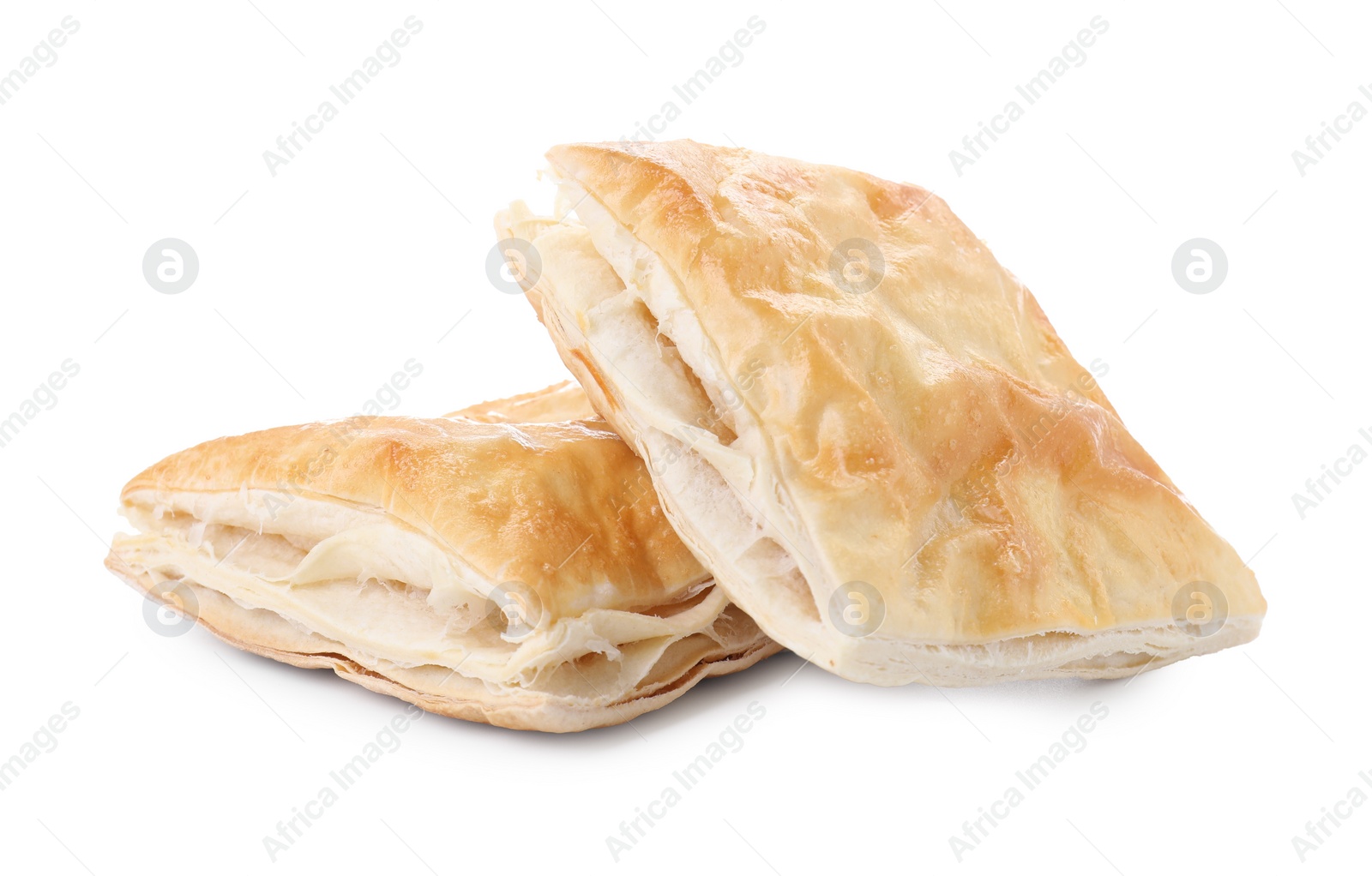 Photo of Delicious fresh puff pastries isolated on white