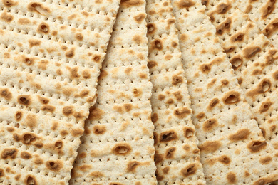 Traditional Matzos as background, top view. Pesach (Passover) celebration