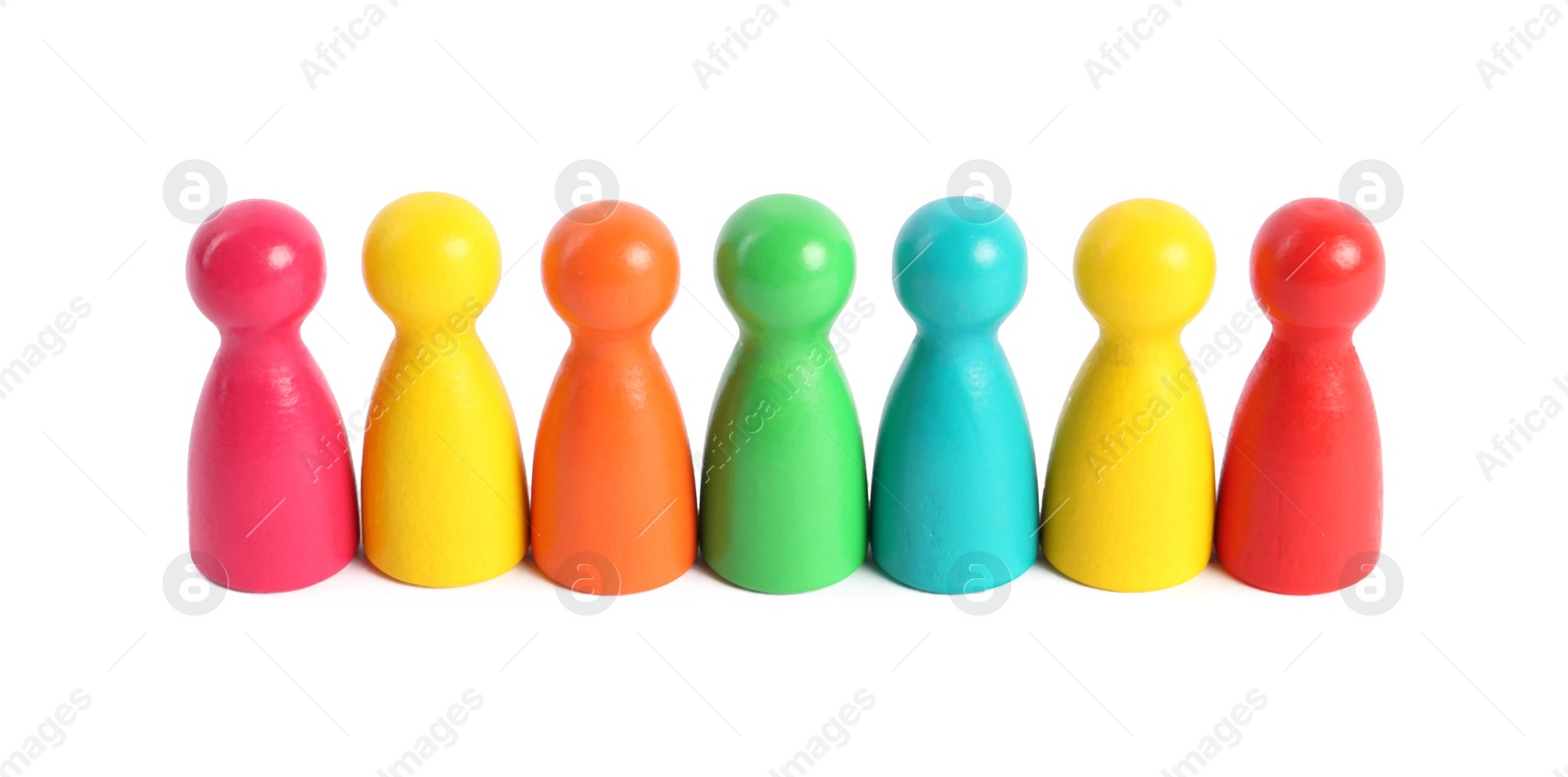 Photo of Colorful pawns on white background. Social inclusion concept