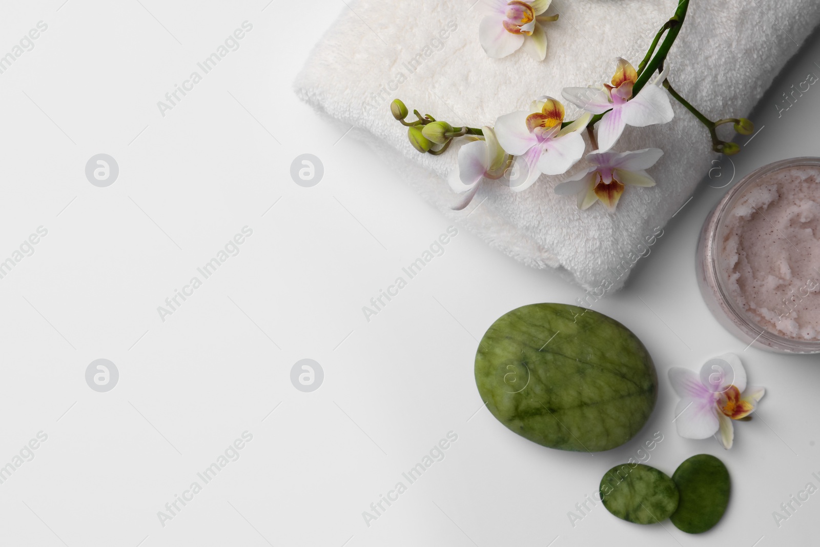 Photo of Flat lay composition with different spa products on white background. Space for text