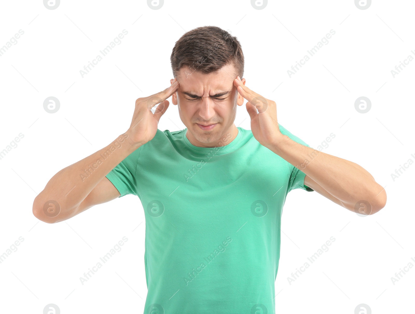 Photo of Young man suffering from headache on white background