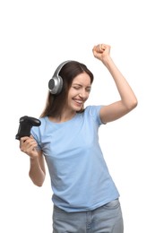 Photo of Happy woman in headphones with game controller on white background