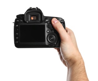 Photo of Photographer holding modern camera on white background, closeup