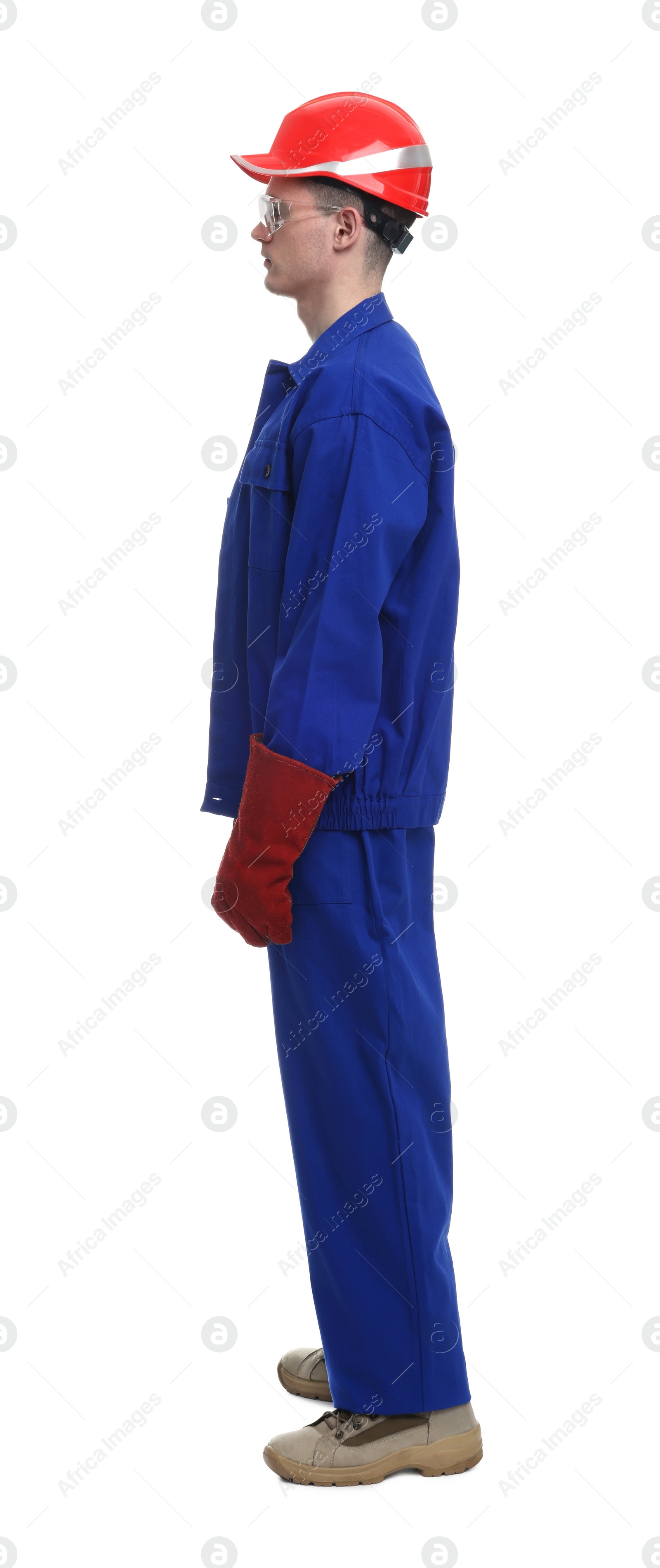 Photo of Young man wearing safety equipment on white background