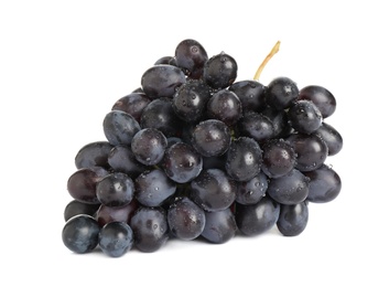 Bunch of fresh ripe juicy dark blue grapes isolated on white