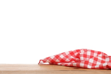 Red checkered cloth on wooden table against white background. Mockup for design