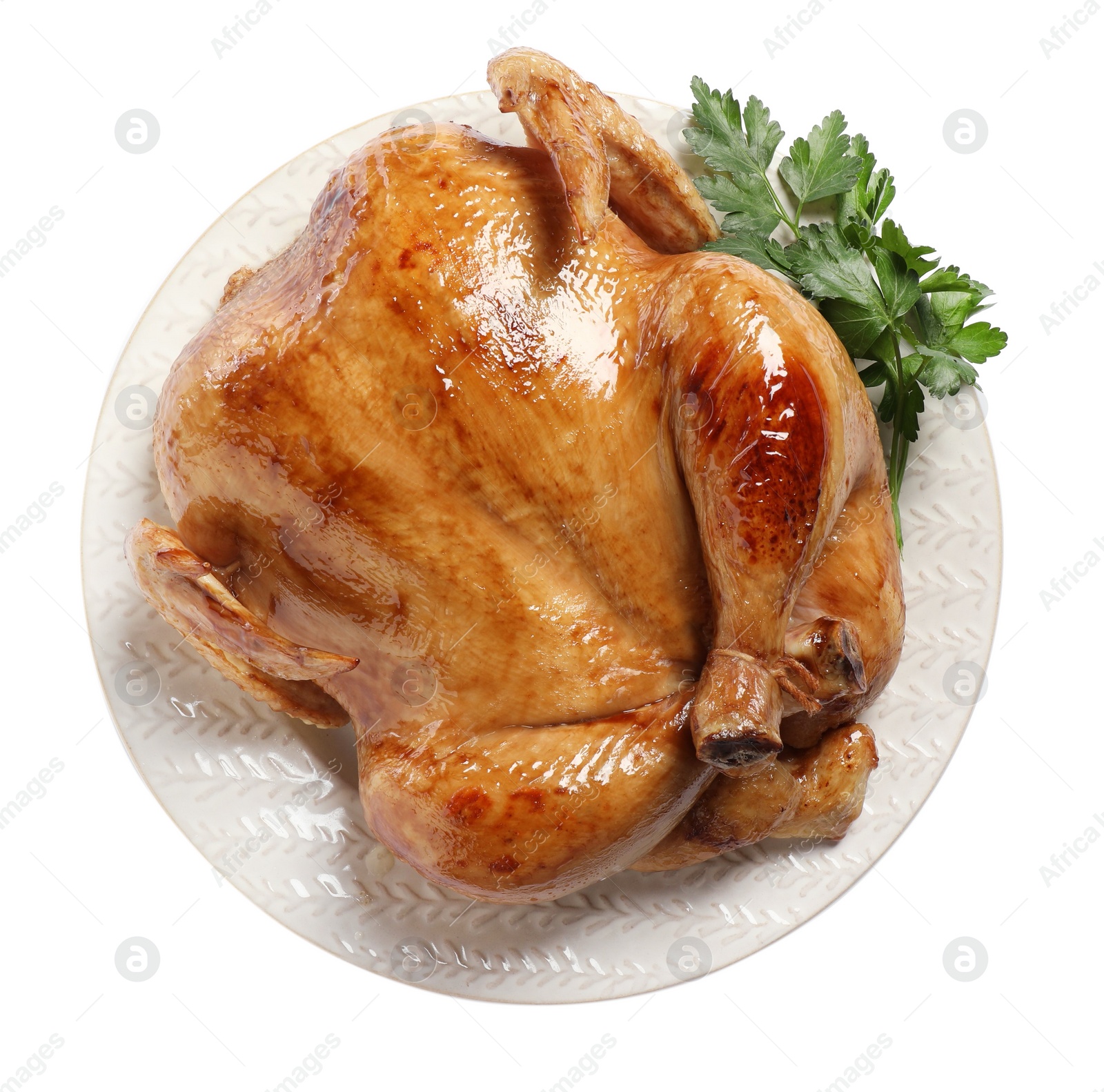 Photo of Tasty roasted chicken with parsley isolated on white, top view