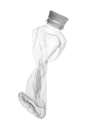 Empty crumpled bottle isolated on white. Plastic recycling