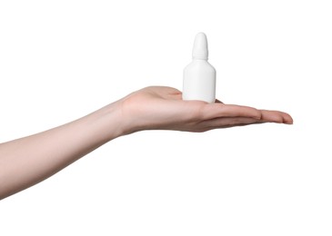 Photo of Woman holding nasal spray on white background, closeup