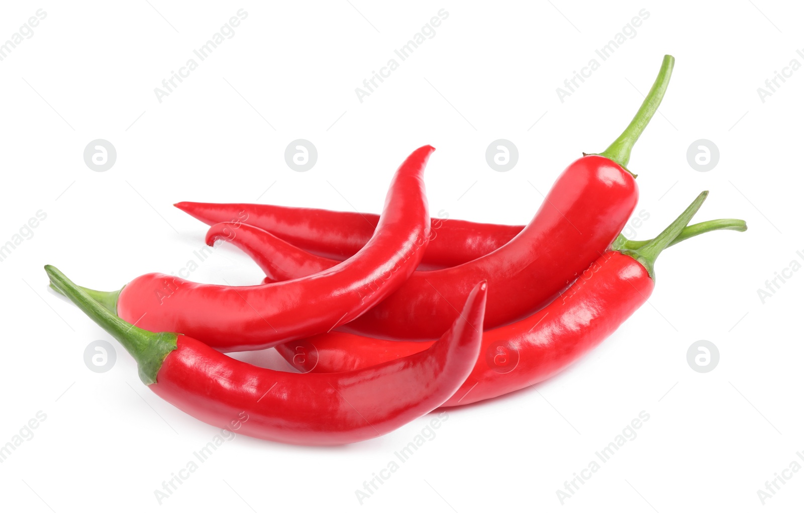 Photo of Red hot chili peppers on white background