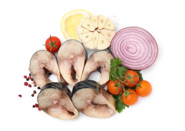 Pieces of mackerel fish and different products on white background, top view