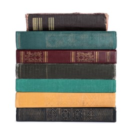 Stack of many old hardcover books isolated on white