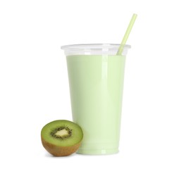 Delicious smoothie in plastic cup and fresh kiwi isolated on white