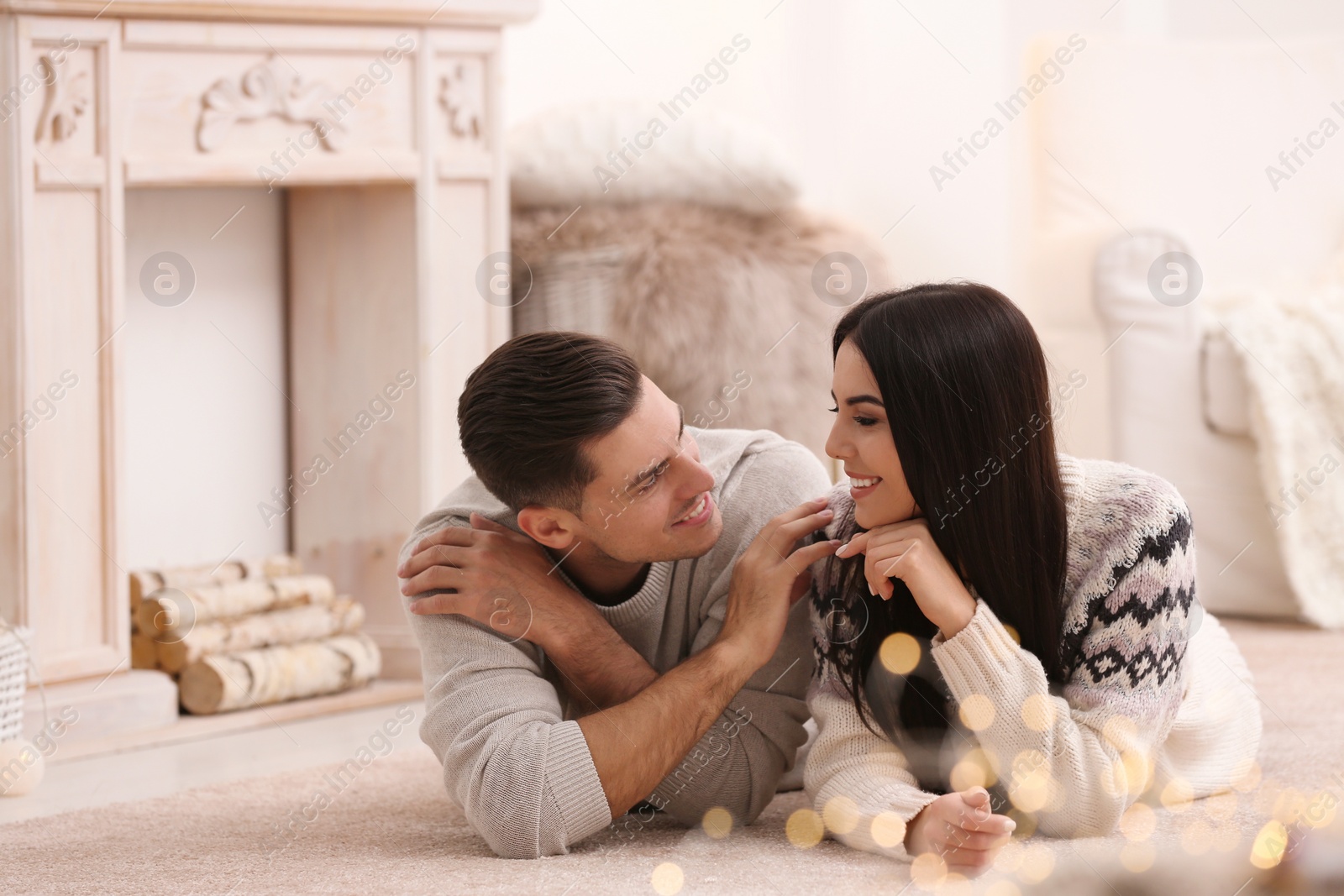 Photo of Happy couple spending time together at home. Winter vacation