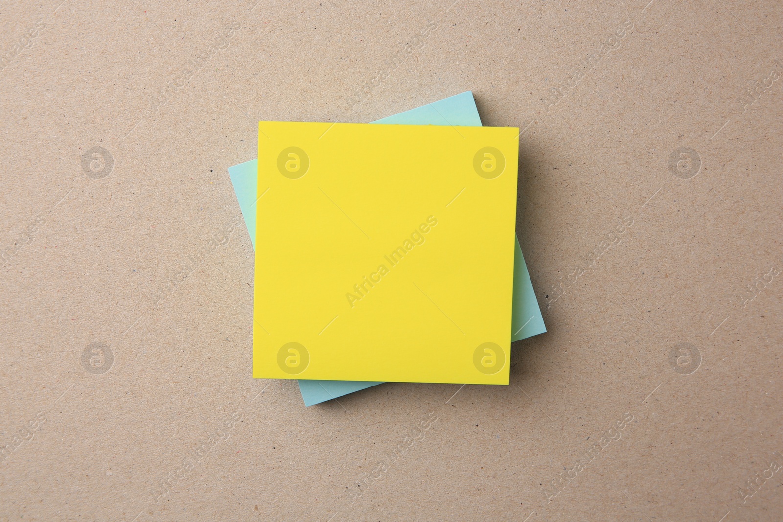 Photo of Blank paper notes on beige background, top view
