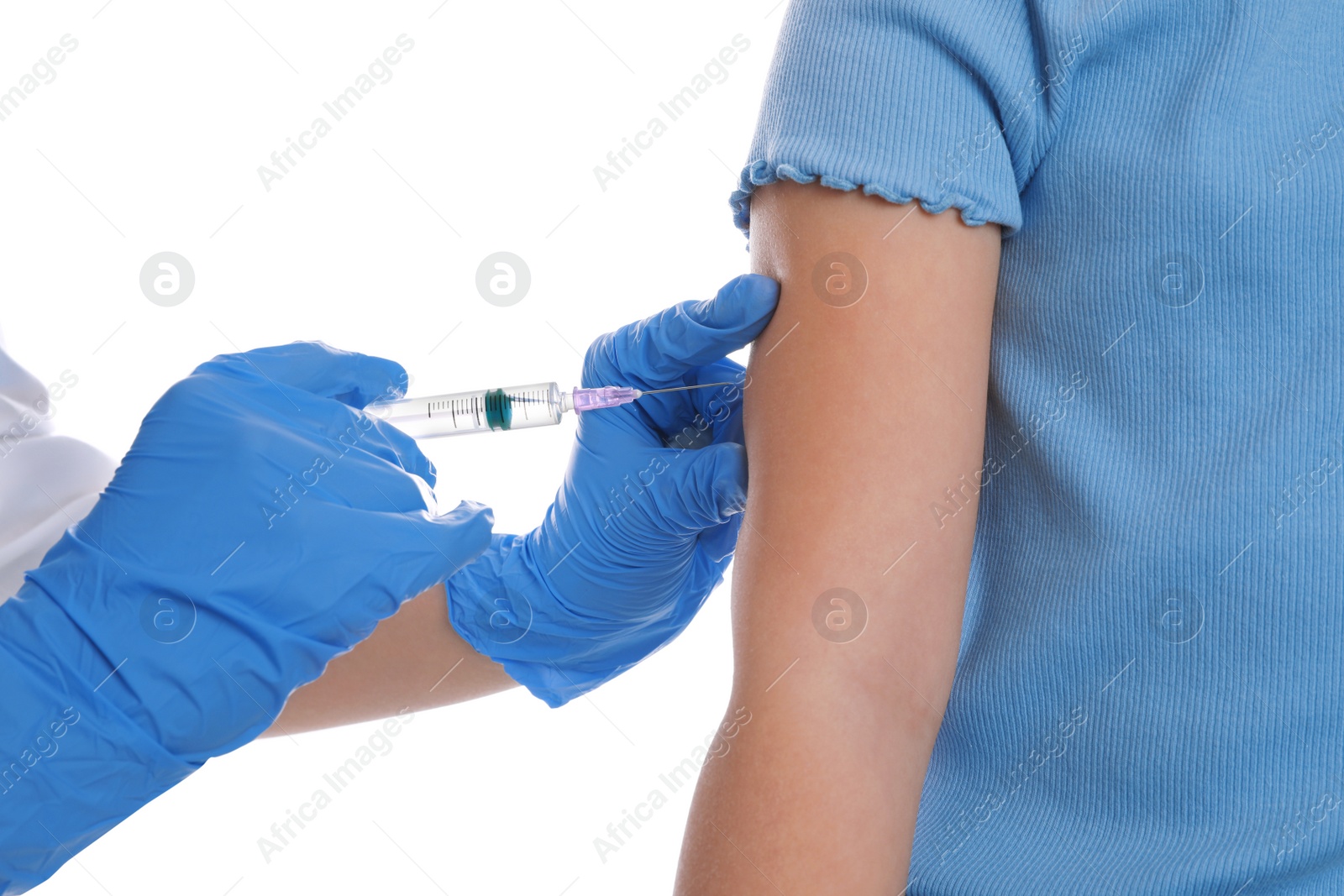 Photo of Little girl receiving chickenpox vaccination on white background, closeup. Varicella virus prevention