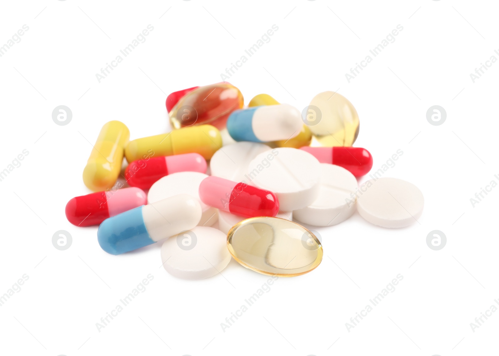 Photo of Many different pills isolated on white. Medicinal treatment