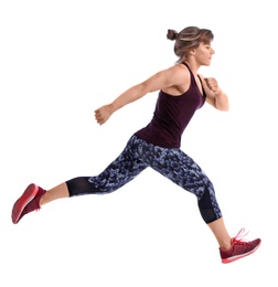 Photo of Young woman in sportswear running on white background