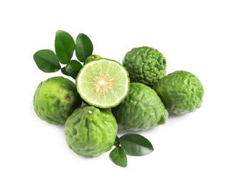 Photo of Fresh ripe bergamot fruits and green leaves on white background, above view