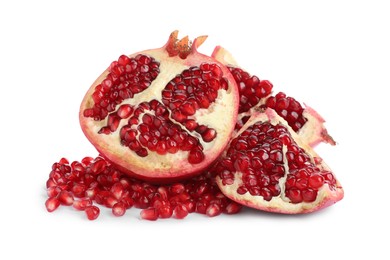 Photo of Cut ripe pomegranate on white background. Delicious fruit