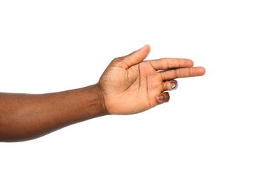 African-American man showing hand gesture on white background, closeup