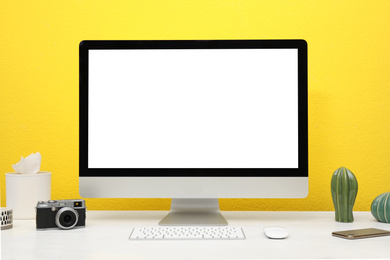 Photo of Comfortable workplace with modern computer on table