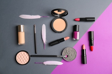 Photo of Flat lay composition with cosmetic products on color background