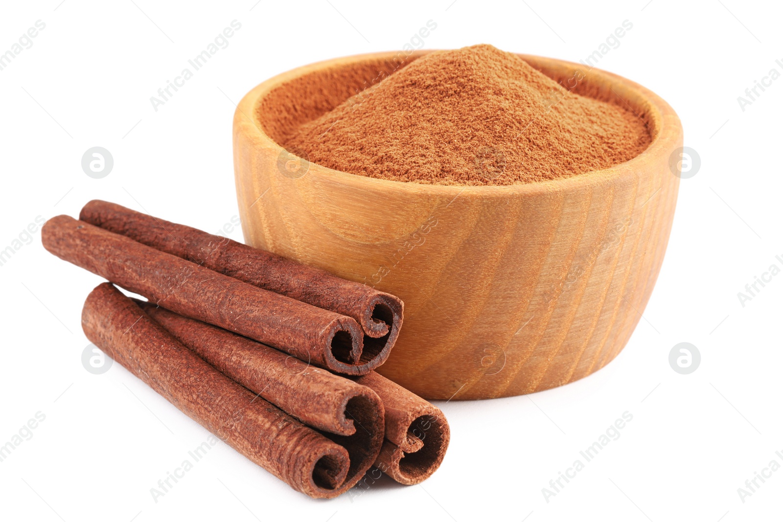 Photo of Dry aromatic cinnamon sticks and powder isolated on white