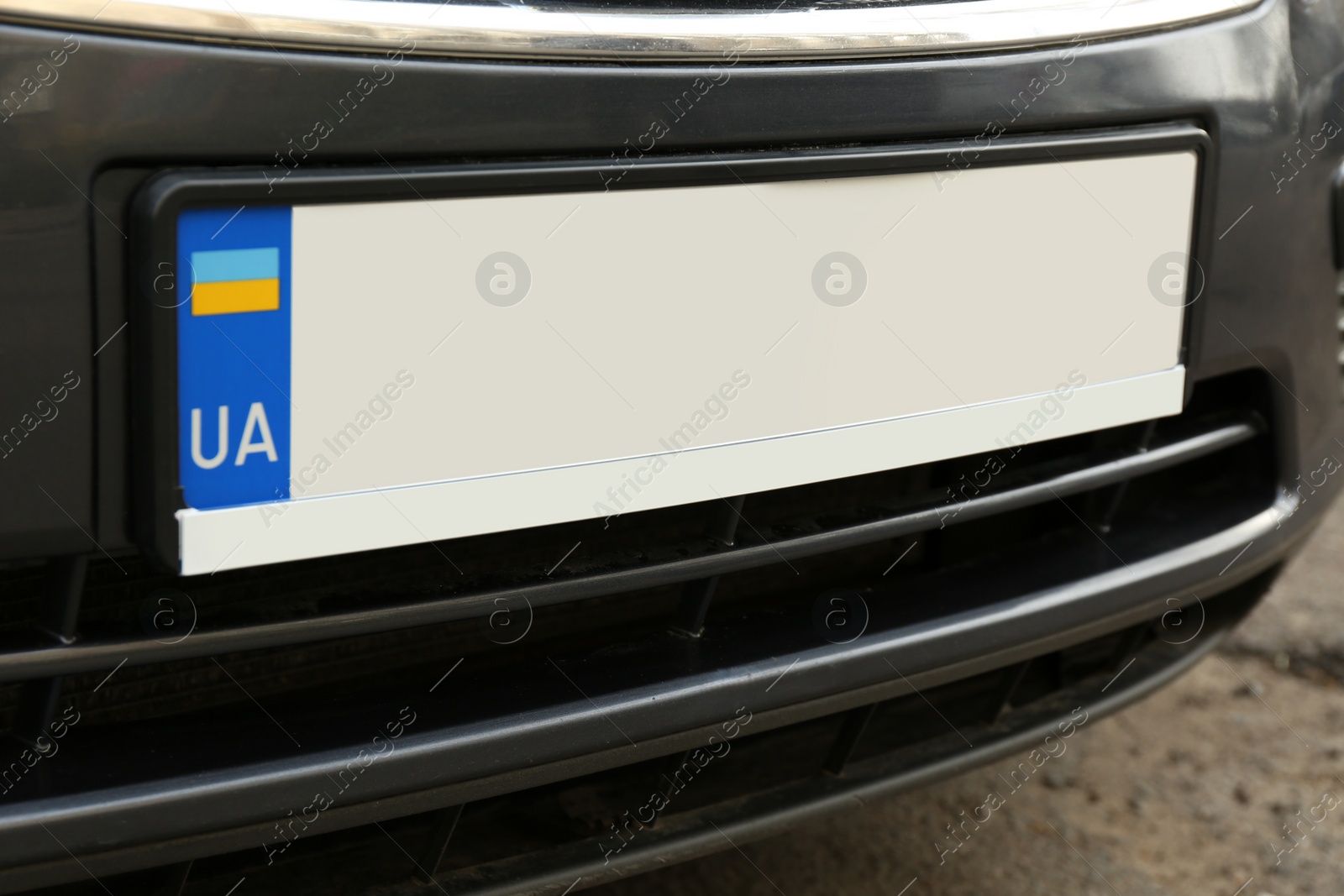 Photo of Car with vehicle registration plate outdoors, closeup