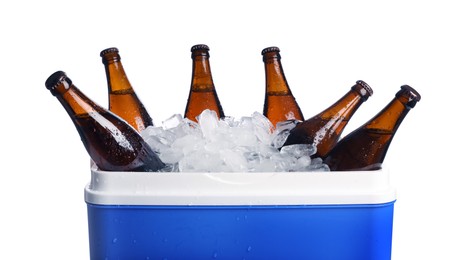 Blue plastic cool box with ice cubes and beer on white background