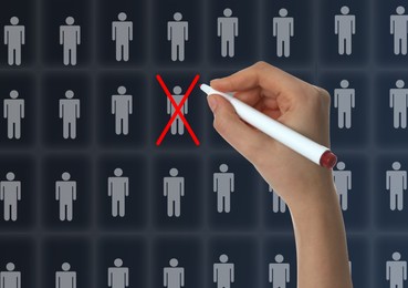 Image of Deciding whether to dismiss employee. Woman with marker near virtual screen, closeup