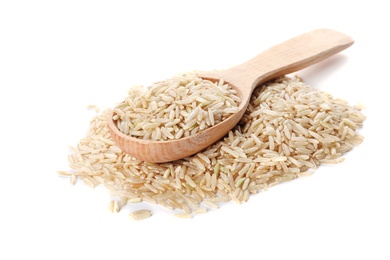 Heap of brown rice and wooden spoon on white background