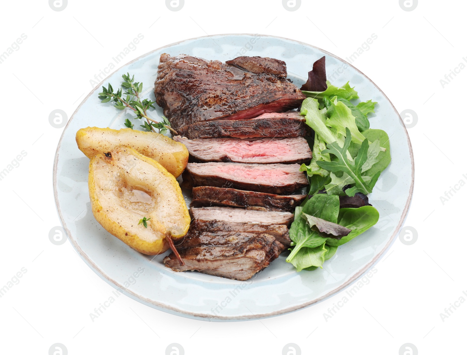 Photo of Pieces of delicious roasted beef meat, caramelized pear and greens isolated on white