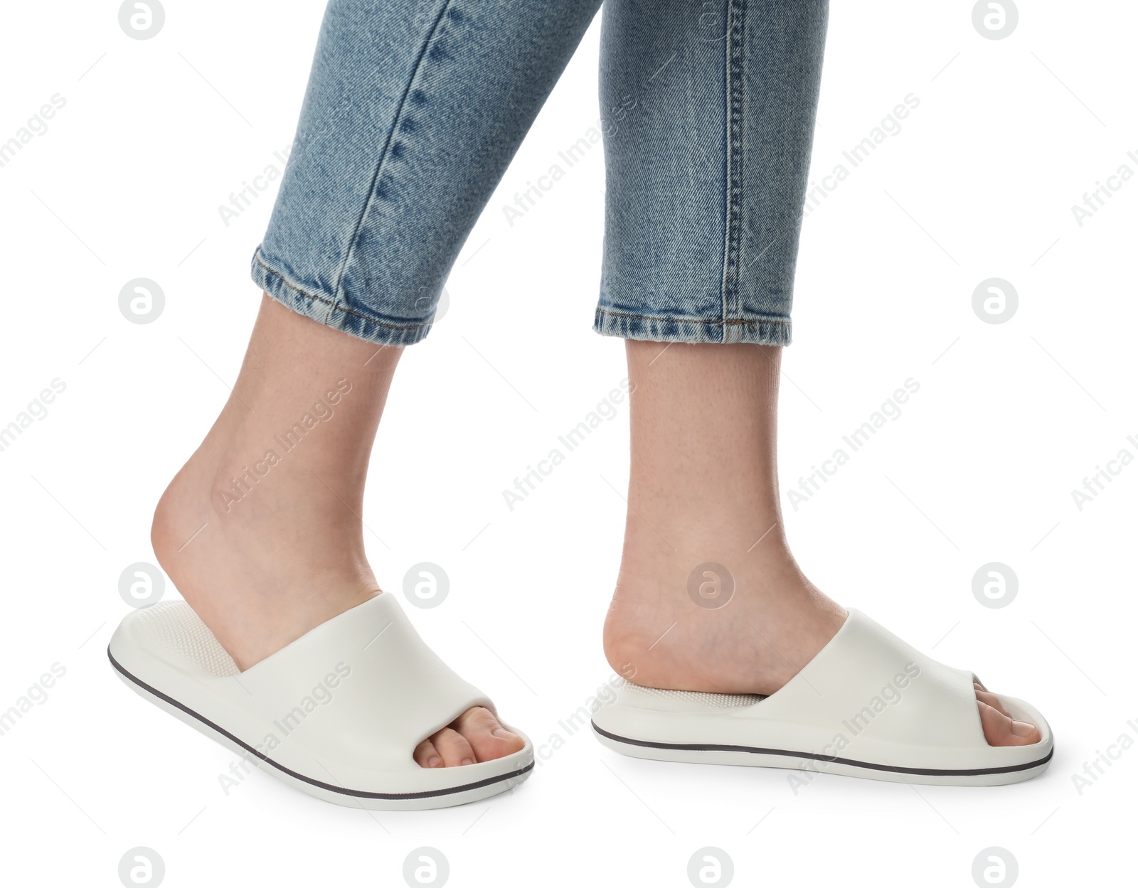 Photo of Woman in slippers on white background, closeup