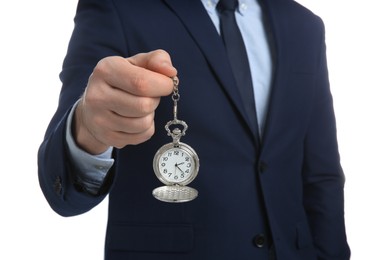 Photo of Businessman holding pocket watch on white background, closeup. Time management