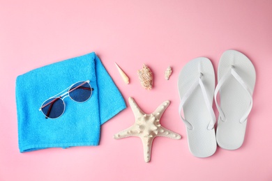 Photo of Flat lay composition with different beach objects on color background